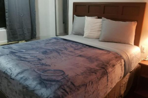 Hotel 2 Queen Beds Hotel Room 201 Wi-Fi Hot Tub Booking